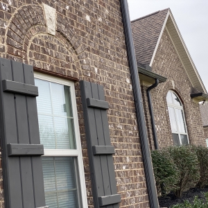 50 Harbor Point | Exteriors features Brick, Natural Stone, & Rich Wood Accents